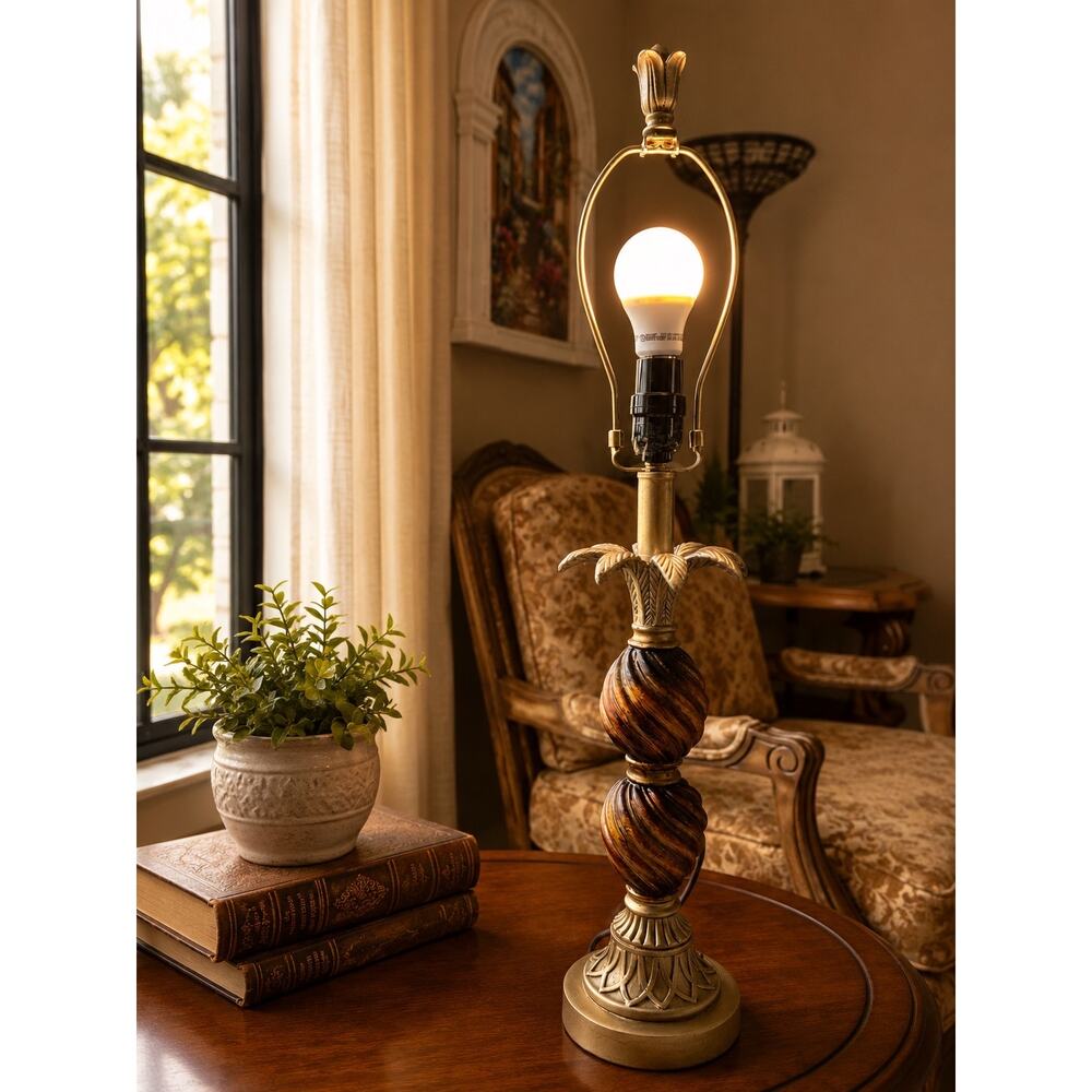 Tropical-style table lamp features a distinctive pineapple palm leaf Hollywood